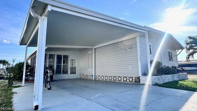 2 bedroom ManufacturedHome at 5545 Sir Walter Way, Old Bridge Village, North Fort Myers — photo 2