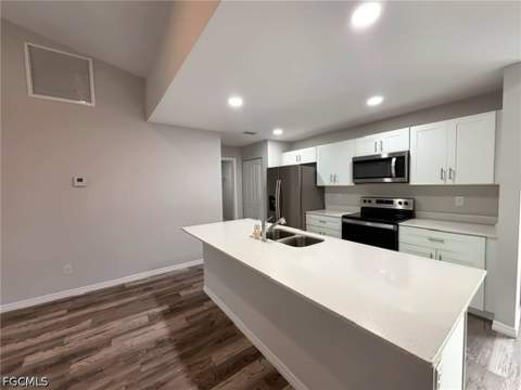 202 NW 25th Pl, Cape Coral FL - photo 12 of 35