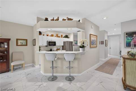 5040 Yacht Harbor Cir 102, Naples FL - photo 12 of 44
