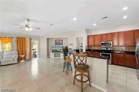 8031 Liriope Loop, Lehigh Acres FL - photo 10 of 47