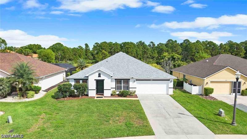 4 bedroom SingleFamilyResidence at 8031 Liriope Loop, Town Lakes, Lehigh Acres — photo 2