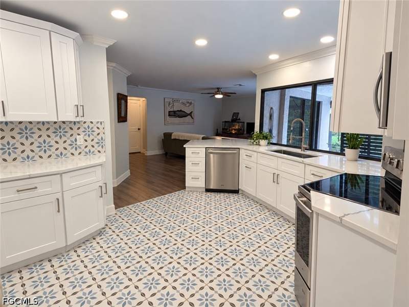 3 bedroom SingleFamilyResidence at 1402 S Larkwood Sq, Coronado Moors, Fort Myers — photo 4