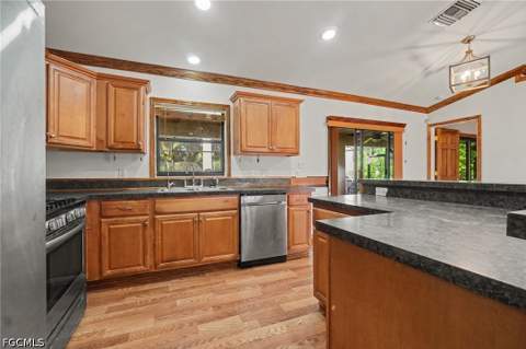 1111 Thompson Ave, Lehigh Acres FL - photo 7 of 27