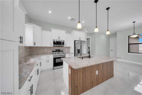 1306 Broadway Ave, Lehigh Acres FL - photo 10 of 47