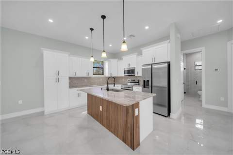 1306 Broadway Ave, Lehigh Acres FL - photo 8 of 47
