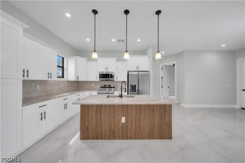 1306 Broadway Ave, Lehigh Acres FL - photo 9 of 47
