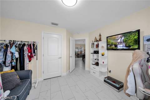 1211 NW 27th Pl, Cape Coral FL - photo 7 of 36