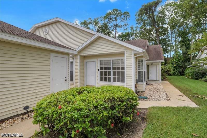 2 bedroom Attached at 1413 Monarch Cir B4, Villas At Berkshire Village, Naples — photo 2