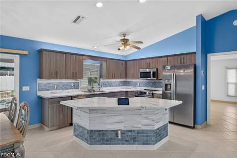 240 SE 28th Ter, Cape Coral FL - photo 7 of 36