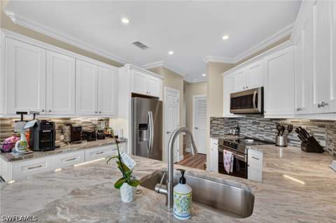 26846 Wyndhurst Ct 101, Bonita Springs FL - photo 12 of 50