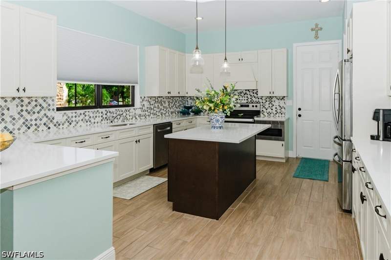 4 bedroom SingleFamilyResidence at 4944 Frattina St, Maple Ridge, Ave Maria — photo 4