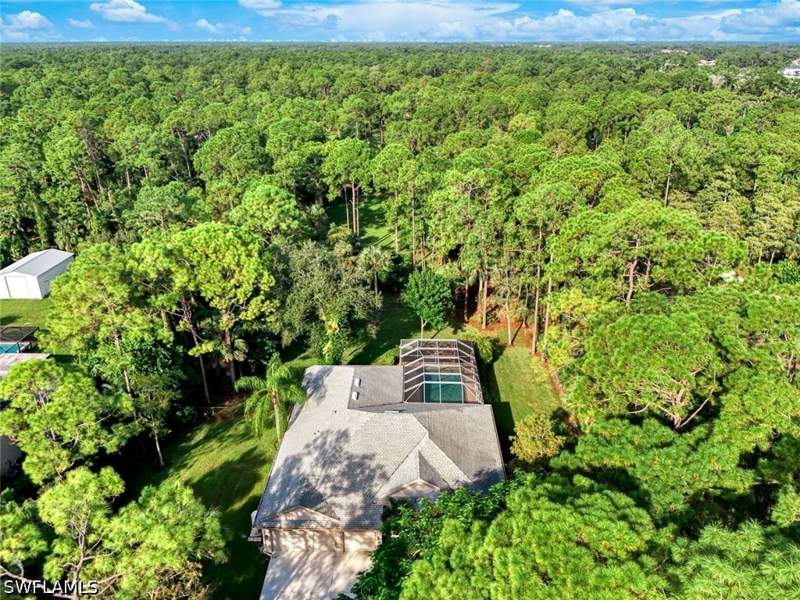 4 bedroom SingleFamilyResidence at 661 27th St NW, Golden Gate Estates, Naples — photo 3