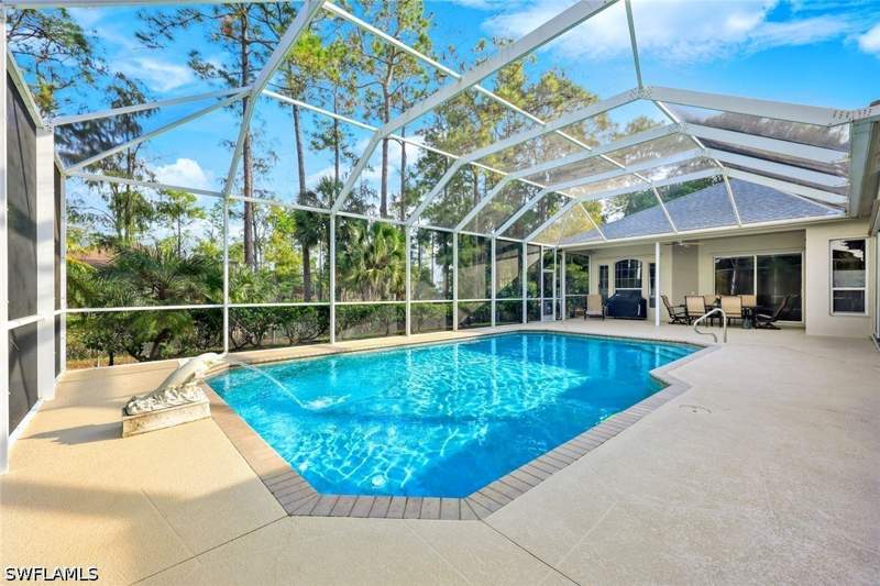 4 bedroom SingleFamilyResidence at 661 27th St NW, Golden Gate Estates, Naples — photo 4