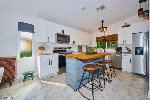 6513 W Royal Woods Dr, Fort Myers FL - photo 7 of 49