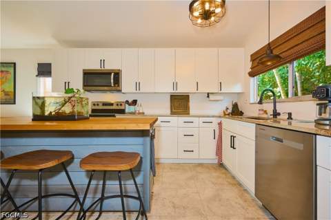 6513 W Royal Woods Dr, Fort Myers FL - photo 9 of 49
