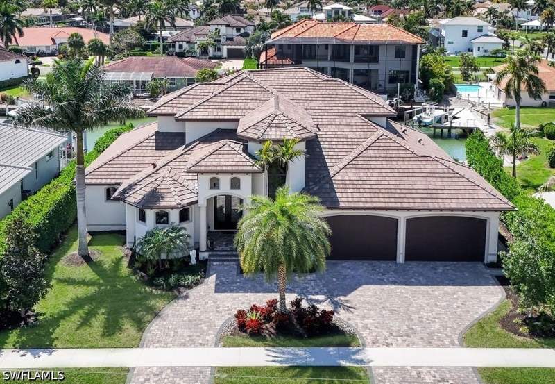 5 bedroom SingleFamilyResidence at 450 Pepperwood Ct, Marco Beach, Marco Island — photo 2