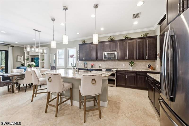 4 bedroom SingleFamilyResidence at 4403 Raffia Palm Cir, Raffia Preserve, Naples — photo 4