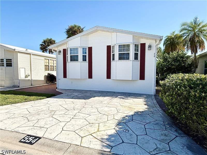 2 bedroom ManufacturedHome at 554 Cattleya Refuge 554, Imperial Wilderness, Naples — photo 2