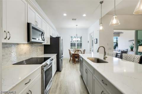 9065 Siesta Bay Dr, Naples FL - photo 11 of 50