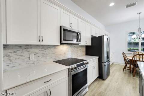 9065 Siesta Bay Dr, Naples FL - photo 12 of 50