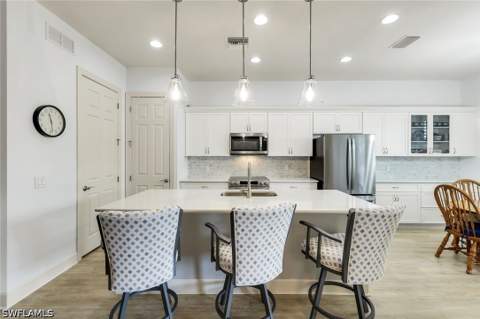 9065 Siesta Bay Dr, Naples FL - photo 13 of 50