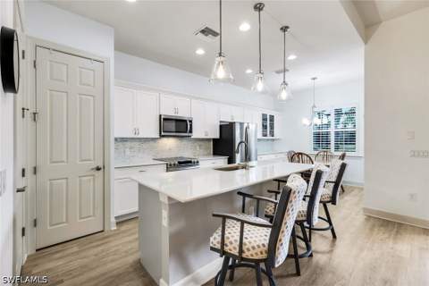 9065 Siesta Bay Dr, Naples FL - photo 9 of 50