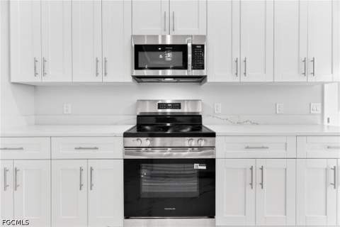 1118 Bari St E, Lehigh Acres FL - photo 14 of 63