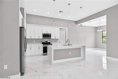 1114 Bari St E, Lehigh Acres FL - photo 10 of 63