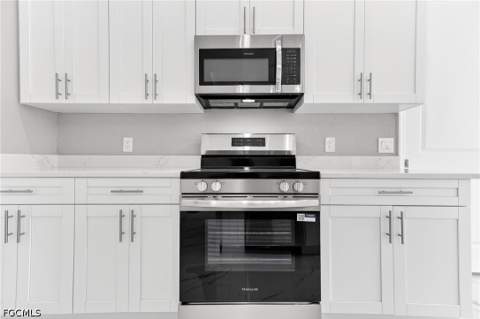 1114 Bari St E, Lehigh Acres FL - photo 16 of 63
