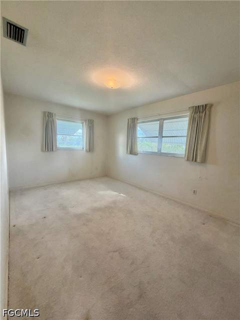 1419 Kimdale St E, Lehigh Acres FL - photo 14 of 47