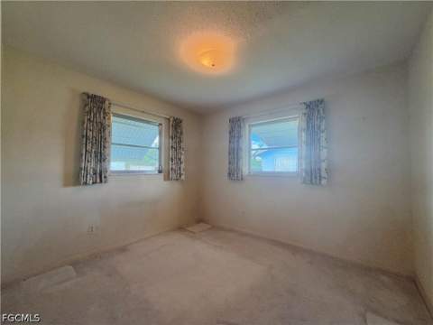 1419 Kimdale St E, Lehigh Acres FL - photo 19 of 47