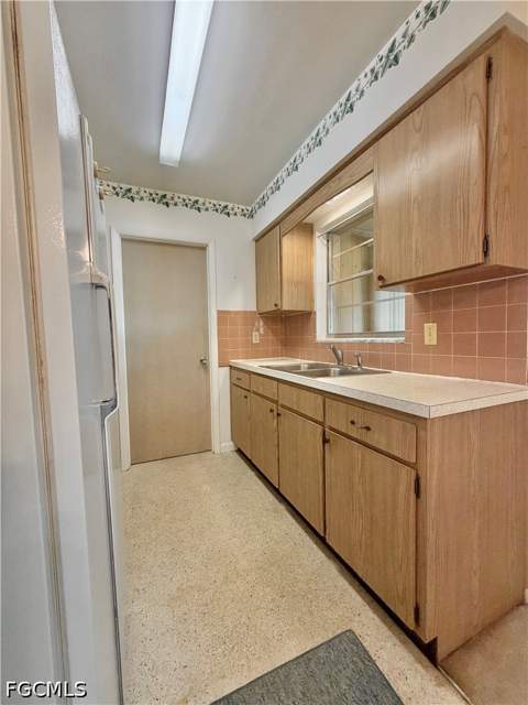 1419 Kimdale St E, Lehigh Acres FL - photo 8 of 47