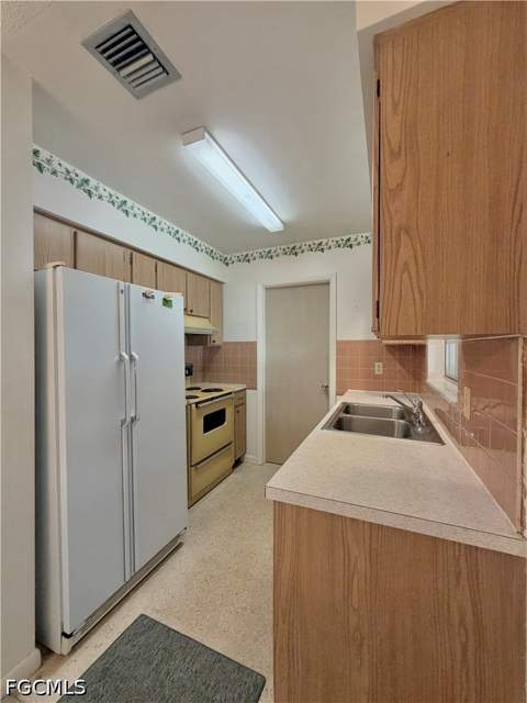 1419 Kimdale St E, Lehigh Acres FL - photo 9 of 47