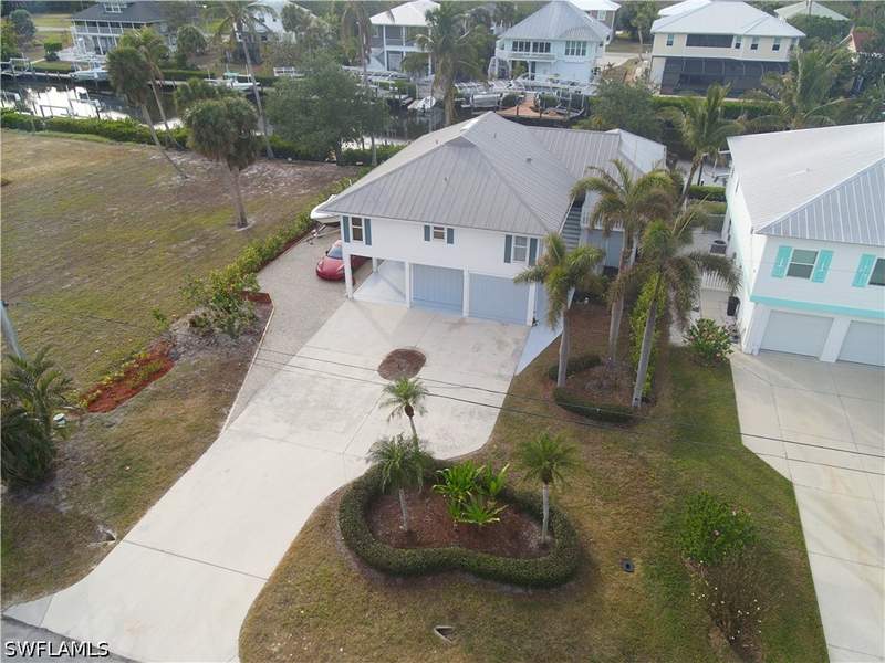 4 bedroom SingleFamilyResidence at 16303 Shoal Ct, Captains Cove, Bokeelia — photo 3