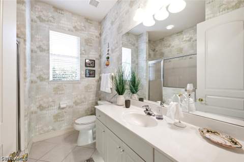 5872 Whisperwood Ct, Naples FL - photo 12 of 48