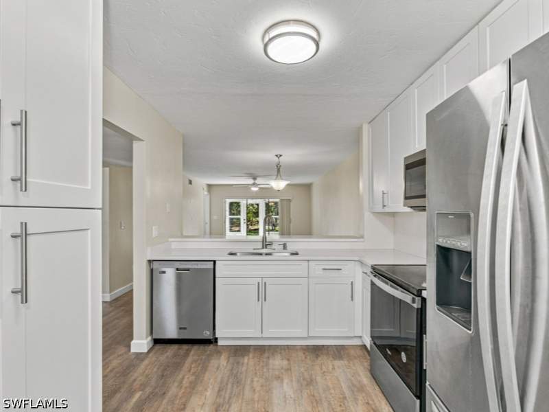 2 bedroom Condominium at 3471 County Barn Rd F-104, Woodmere Racquet Club, Naples — photo 4