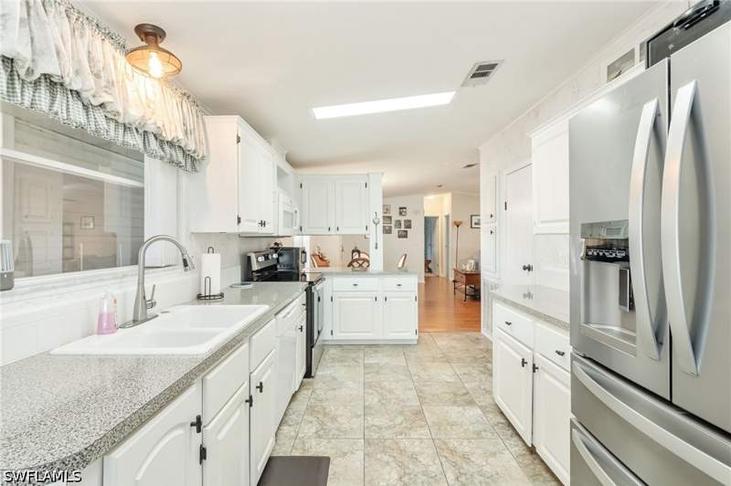 3 bedroom ManufacturedHome at 9749 Sugarberry Way, Crystal Lakes, Fort Myers — photo 5