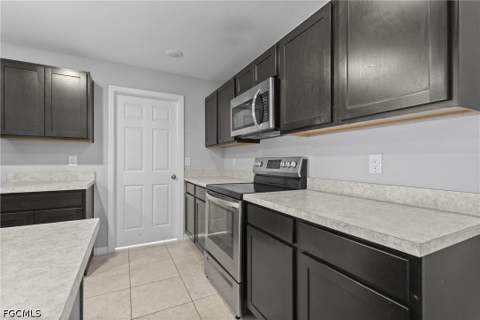 4137 NE 14th Pl, Cape Coral FL - photo 10 of 30