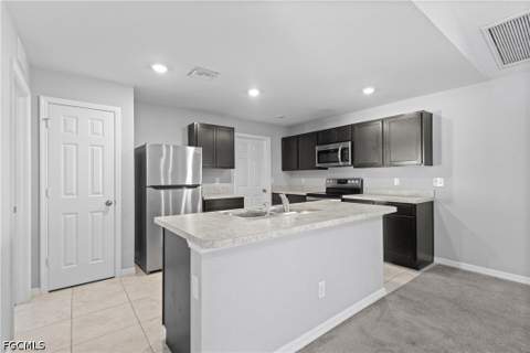 4137 NE 14th Pl, Cape Coral FL - photo 12 of 30