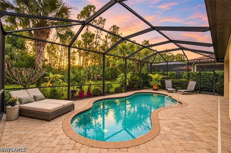 4 bedroom SingleFamilyResidence at 4395 Raffia Palm Cir, Raffia Preserve, Naples — photo 2