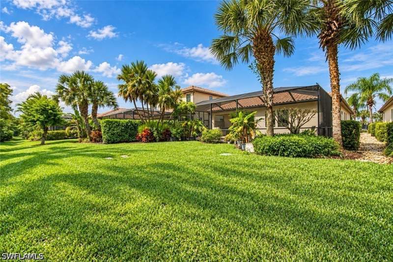4 bedroom SingleFamilyResidence at 4395 Raffia Palm Cir, Raffia Preserve, Naples — photo 3