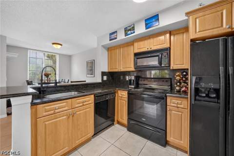 1240 Wildwood Lakes Blvd 101, Naples FL - photo 10 of 26