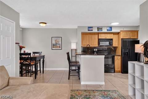 1240 Wildwood Lakes Blvd 101, Naples FL - photo 8 of 26