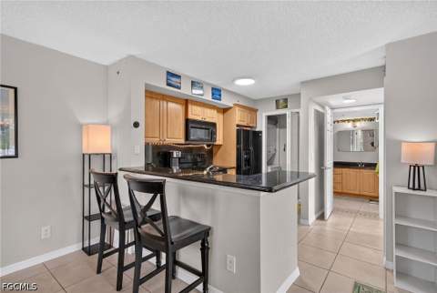 1240 Wildwood Lakes Blvd 101, Naples FL - photo 9 of 26