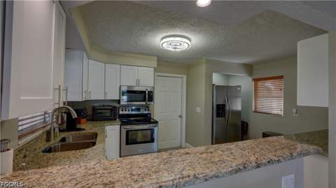 3118 SE 18th Ave, Cape Coral FL - photo 10 of 51