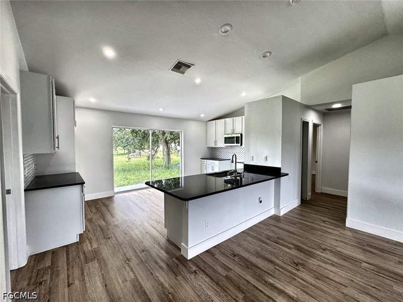 4 bedroom SingleFamilyResidence at 1094 Alabama Rd S, Mirror Lakes, Lehigh Acres — photo 2