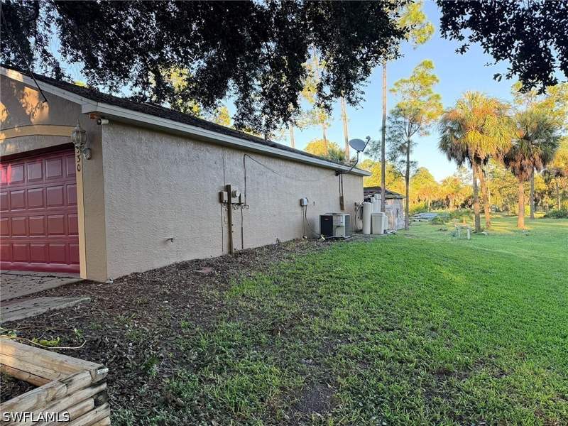 3 bedroom SingleFamilyResidence at 330 12th St SE, Golden Gate Estates, Naples — photo 2