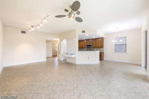 9537 Ironstone Ter 101, Naples FL - photo 6 of 35