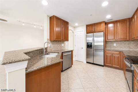 9537 Ironstone Ter 101, Naples FL - photo 9 of 35