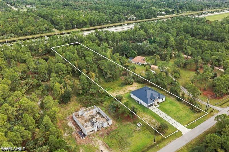 5 bedroom SingleFamilyResidence at 407 24th Ave NW, Golden Gate Estates, Naples — photo 4
